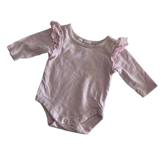 Dymples Age 000 long sleeve bodysuit in pale pink with eyelet lace frill trim at shoulders â€” gently loved condition.