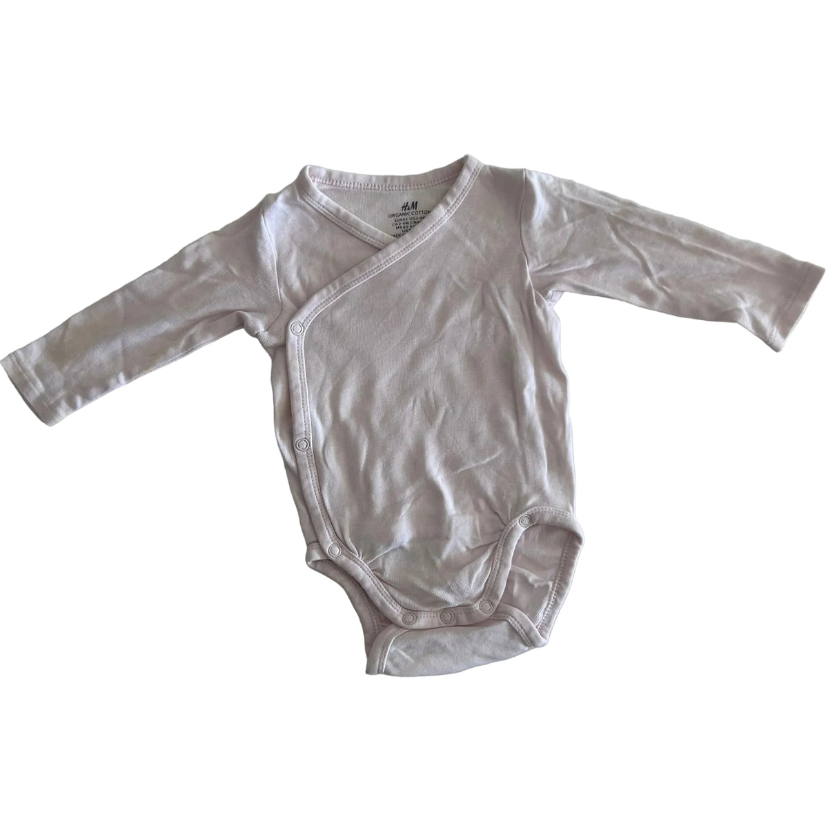 H&M Age 000 long sleeve wrap bodysuit in light pink with plain â€” gently loved condition.