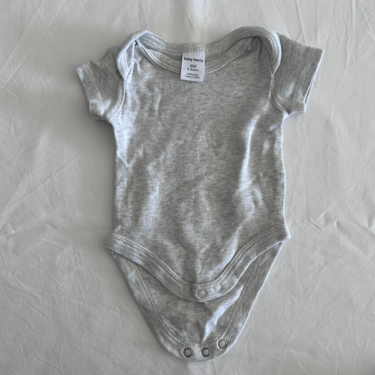 Baby Berry Age 000 short sleeve bodysuit in light grey with plain â€” like new condition.