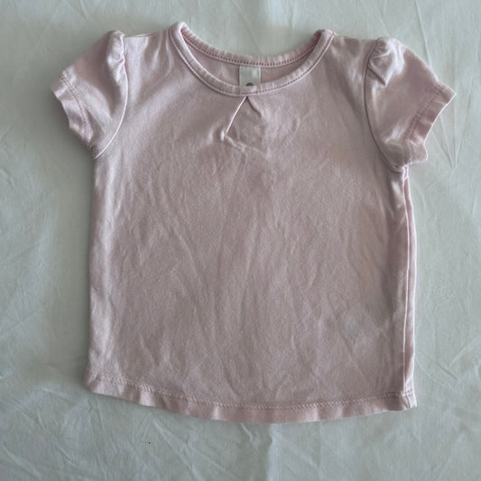 Dymples Age 000 short sleeve t-shirt in light pink with ruffle sleeve trim, small pleat detail at neckline â€” gently loved condition.