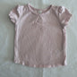Dymples Age 000 short sleeve t-shirt in light pink with ruffle sleeve trim, small pleat detail at neckline â€” gently loved condition.