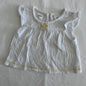 Anko Age 000 flutter sleeve dress in white with yellow trim with crinkle/muslin texture, yellow satin bow at neckline, yellow ribbon trim at hem â€” gently loved condition.