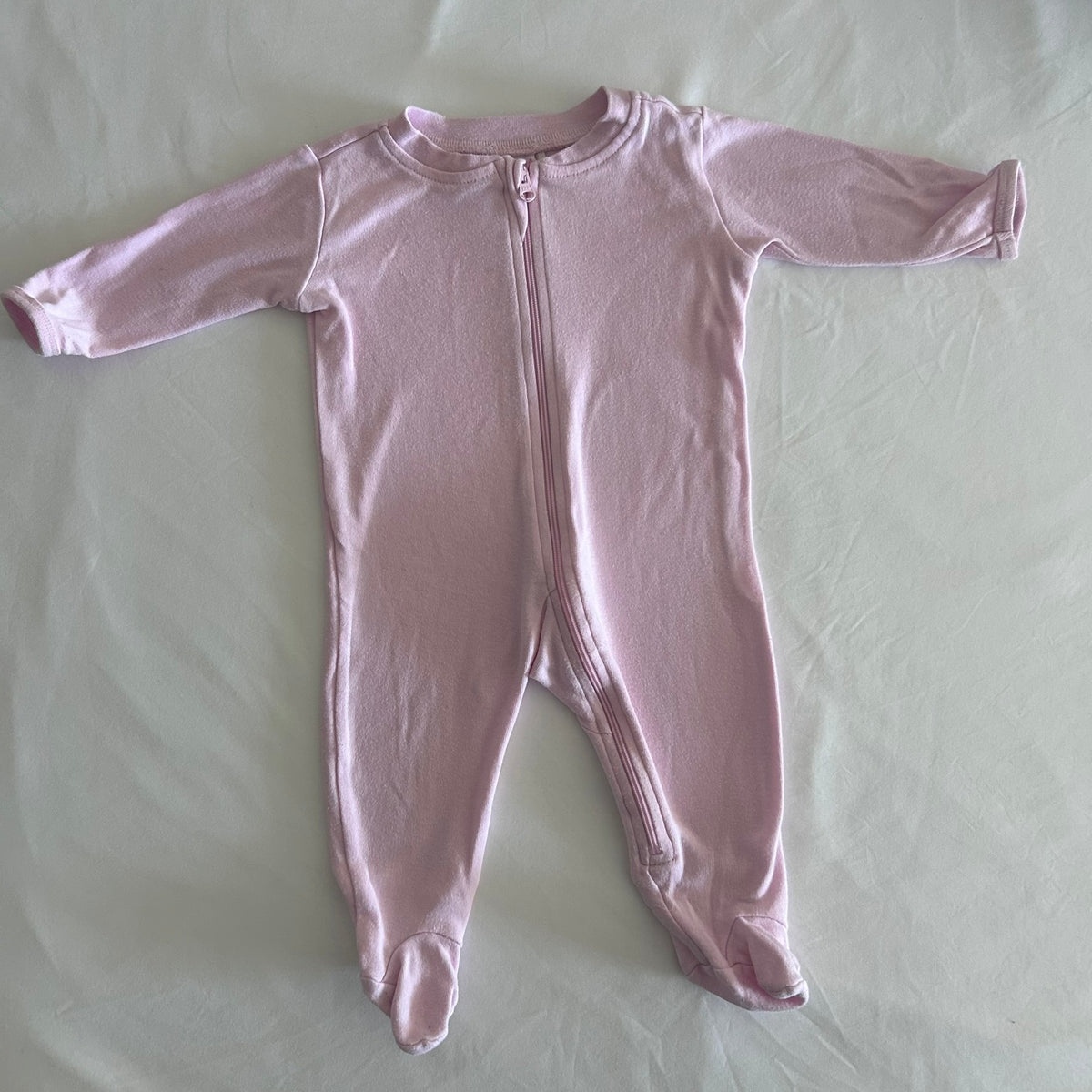 Anko Age 000 long sleeve zip footed sleepsuit in pink with plain â€” gently loved condition.