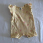 Dymples Age 000 romper in yellow, pink, green, white with citrus fruit print (oranges, lemons, sliced citrus), short sleeved â€” gently loved condition.