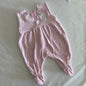 Creation Stummer Age 00 romper in pink, white with white satin bow applique, scalloped neckline trim, small embroidered dot details, gently loved condition.