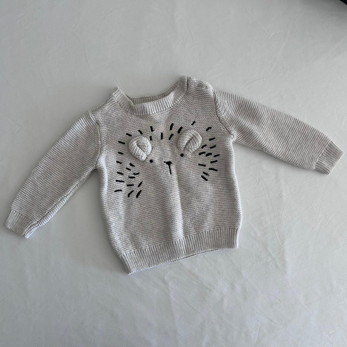 Target Age 00 long sleeved knit pullover sweater in oatmeal/cream with 3d bear face with embroidered whiskers and nose â€” like new condition.