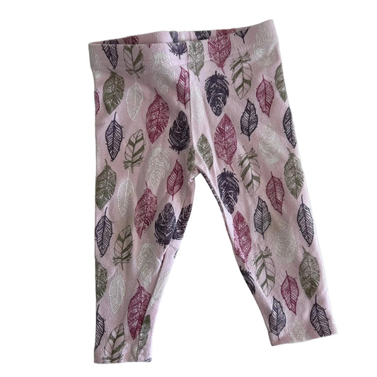 Cutie Pie Age 0 trousers / leggings in pink, dark grey, burgundy, olive green, white with all-over leaf/feather print in multiple colours â€” gently loved condition.