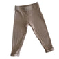Dymples Age 0 trousers / ribbed leggings in light brown / beige with ribbed texture, cuffed ankles â€” gently loved condition.