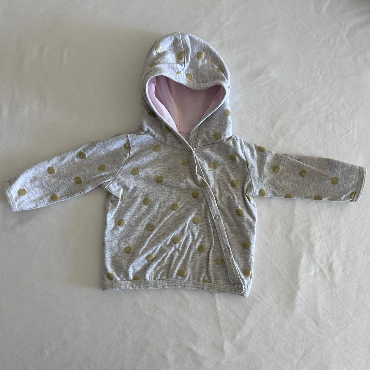 Cotton On Age 00 hooded zip-up jacket in grey, pink (hood lining), gold with gold polka dots â€” gently loved condition.