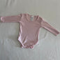 Anko Age 00 long sleeve bodysuit in pink with plain, gently loved condition.