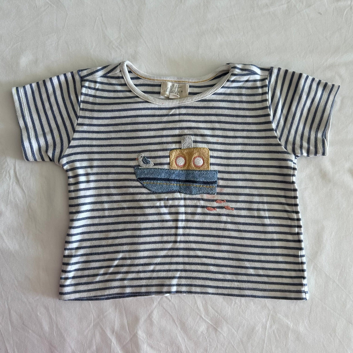 Albetta Age 1 short sleeved t-shirt in white and blue-grey with horizontal stripes with embroidered nautical boat, seagull and fish appliqué — well loved condition.
