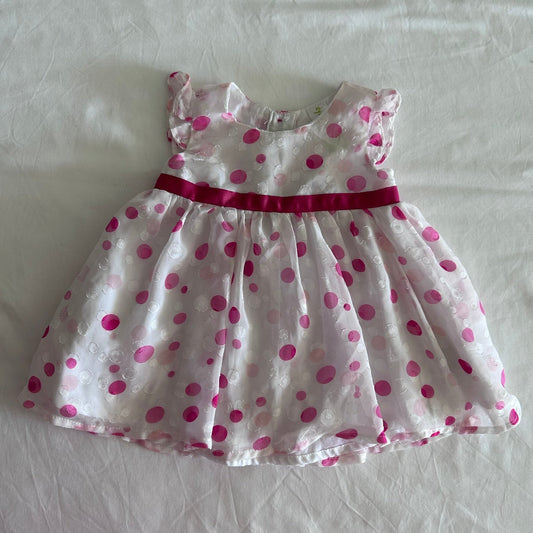 Dymples Age 000 sleeveless dress in white, pink, hot pink with polka dots, embossed circle texture, hot pink ribbon waistband, ruffle neckline — gently loved condition.