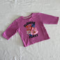 Mango Age 1 long sleeved tee in pink with glitter/foil cartoon flower graphic with text 'flower party' — well loved condition.