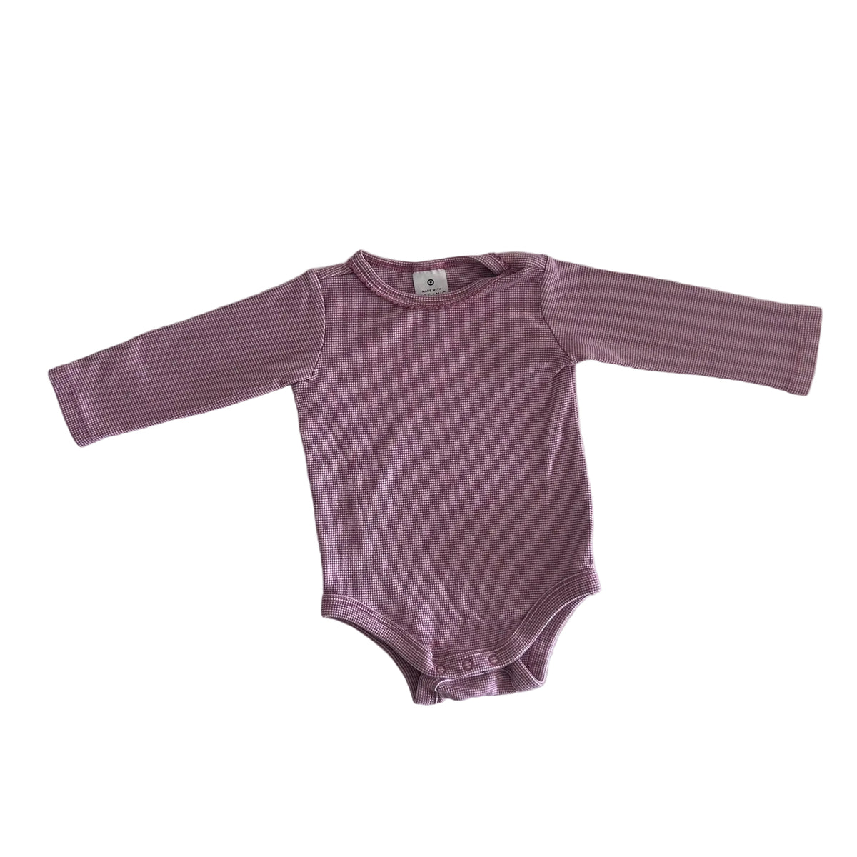 A long-sleeve baby bodysuit in a dusty mauve-purple color, laid flat on a white fabric background.