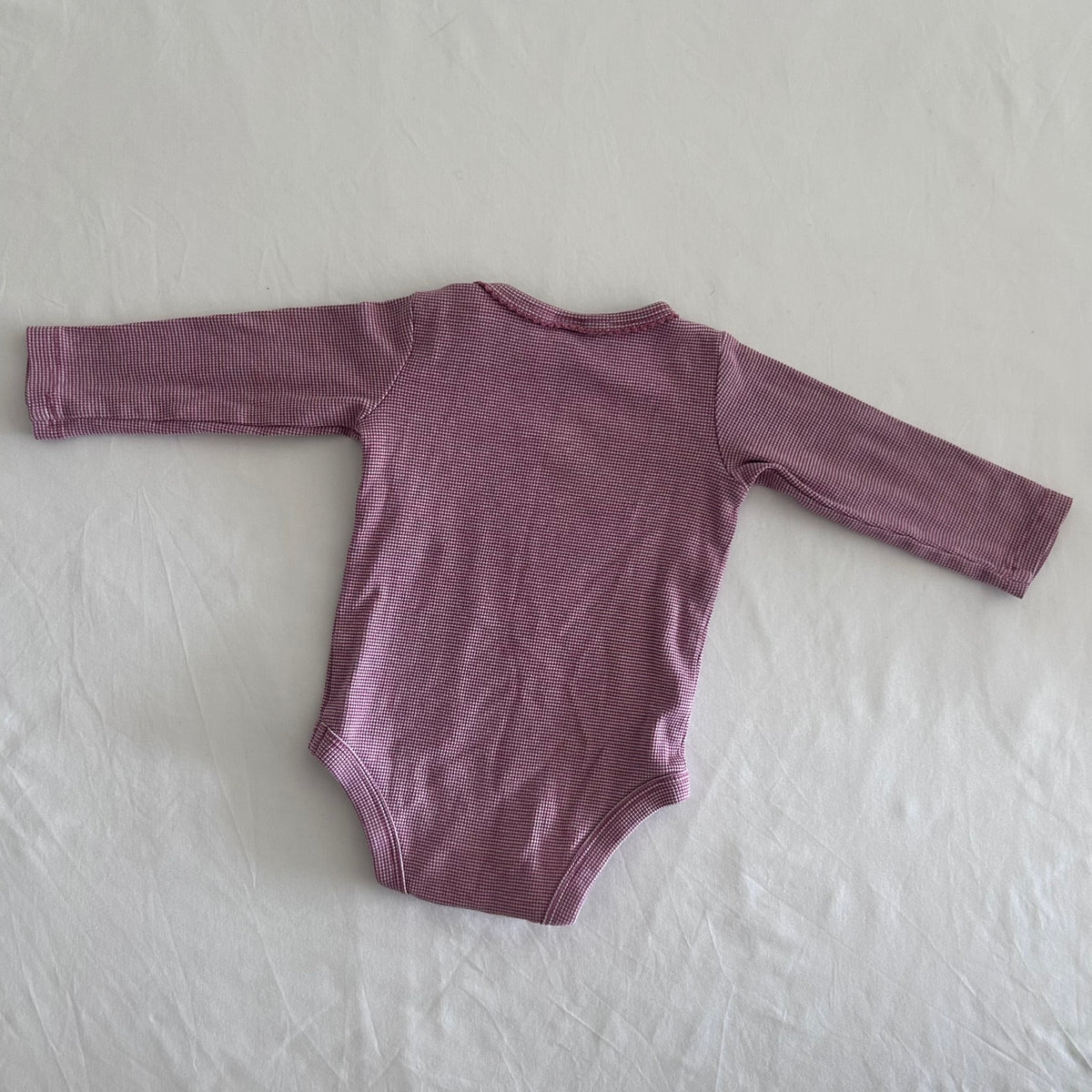 Target Age 00 long sleeve bodysuit in pink and white with mini gingham check — like new condition.