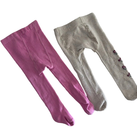 Age 00 (unspecified, estimated based on size) footed tights (x2) in pink; oatmeal/beige with pink: plain; oatmeal: floral embroidery with zigzag trim detail on lower leg — gently loved condition.
