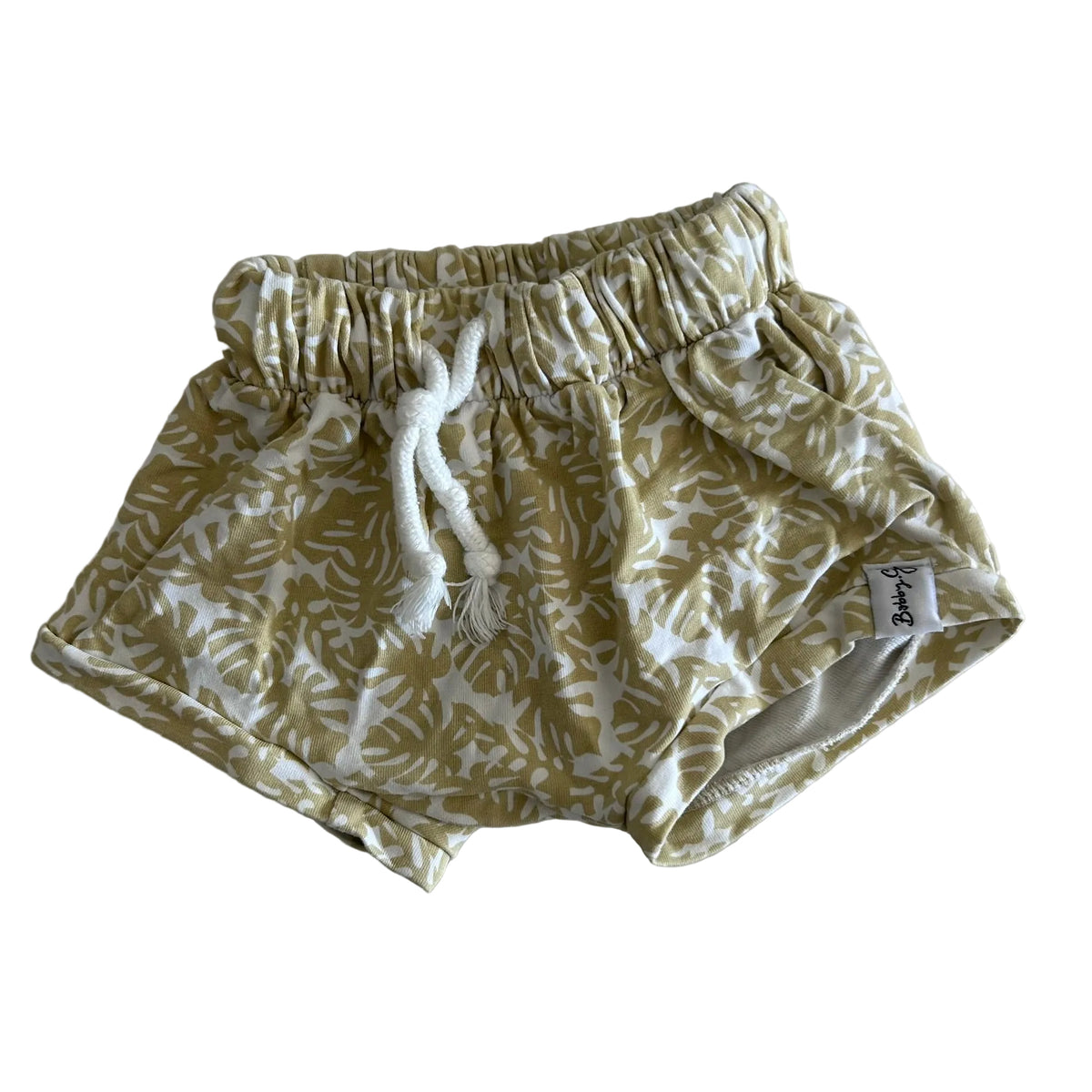 Bobby G Age 1 bubble shorts in golden yellow and white with tropical monstera leaf print — like new condition.