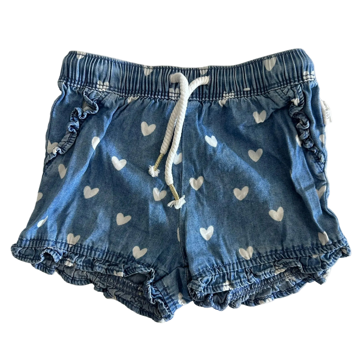 Sprout Age 0 pull-on shorts in blue, white with all-over white heart print, elasticated ruffle hem, elasticated waistband with white drawstring — gently loved condition.