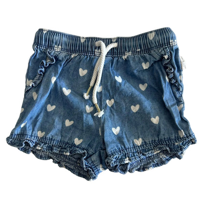 Sprout Age 0 pull-on shorts in blue, white with all-over white heart print, elasticated ruffle hem, elasticated waistband with white drawstring — gently loved condition.