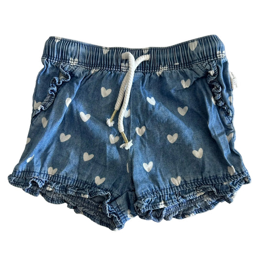 Sprout Age 0 pull-on shorts in blue, white with all-over white heart print, elasticated ruffle hem, elasticated waistband with white drawstring — gently loved condition.