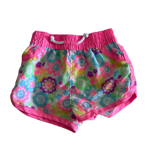 Tiny Little Wonders Age 00 shorts in hot pink, white, teal, purple, yellow, green with floral print with pink elastic waistband and trim — like new condition.
