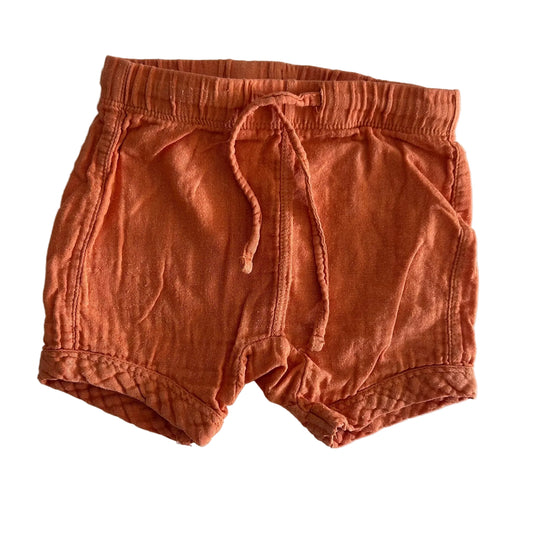 Baby Baby Age 00 shorts in burnt orange with plain — gently loved condition.