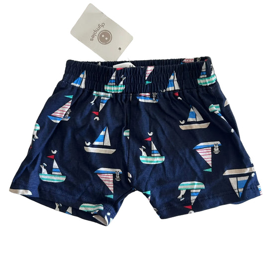 Dymples Age 000 shorts in navy blue, white, red, blue, green with sailboats with animal sailors and seabirds print — new condition.