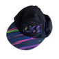 Loose Kid Size 0 cap in black, navy, pink, purple, blue, green with multicolour abstract streak print on brim, embroidered lki logo patch on front — gently loved condition.