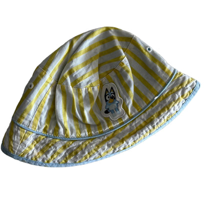 Bluey Age 0 bucket hat in yellow, white, light blue with yellow and white stripes, bluey character patch appliqué — gently loved condition.