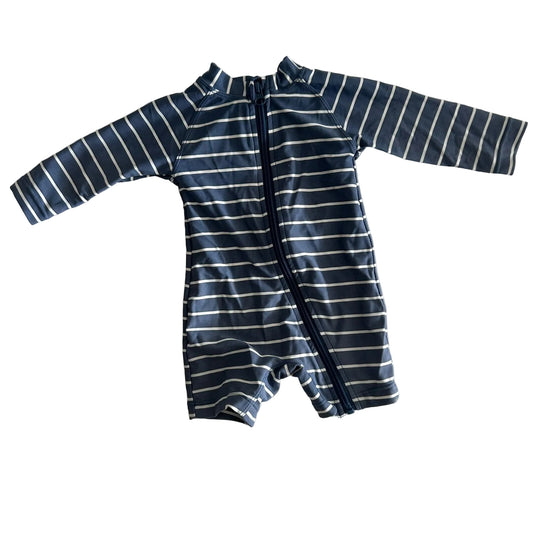 Anko Age 00 long sleeve zip-up baby swimsuit / rashguard romper in navy blue and white with horizontal stripes — gently loved condition.