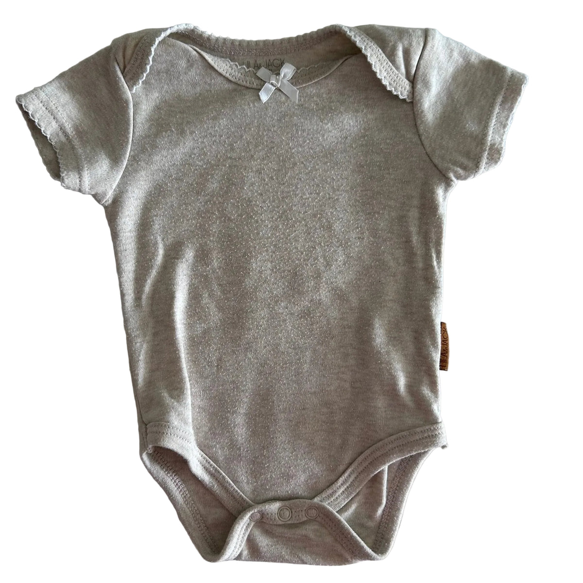 Lila & Jack Age 00 short sleeve bodysuit in oat/beige marl with scallop/picot trim on neckline and sleeves, small satin bow at neckline — well loved condition.
