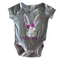 Baby Berry Age 00 short sleeve bodysuit in grey, lilac, white, purple with bunny face graphic with bow and 'snuggle bunny' text print — gently loved condition.
