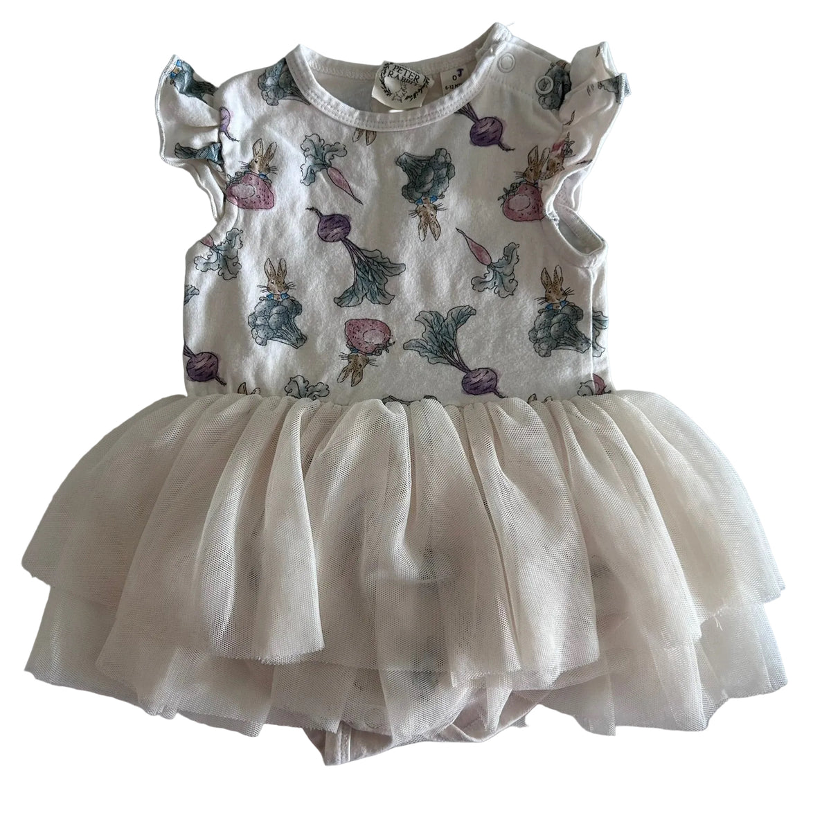 Peter Rabbit Age 0 short sleeved bodysuit tutu dress in white, cream with peter rabbit characters (rabbits, beets, carrots, strawberries, leafy vegetables) allover print with layered cream tulle skirt and flutter sleeves — gently loved condition.
