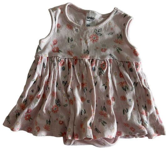 Anko Age 00 sleeveless dress bodysuit in light pink with floral print with pink, red, green and yellow flowers on ribbed fabric — gently loved condition.