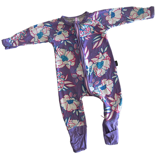 Bonds Age 00 long sleeve zip-up footed wondersuit / sleepsuit in purple, white, pink, teal with large floral print with flowers and leaves â€” like new condition.